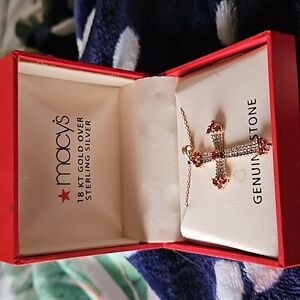 Gold Silver Diam9nd and Garnet Cross Necklace.